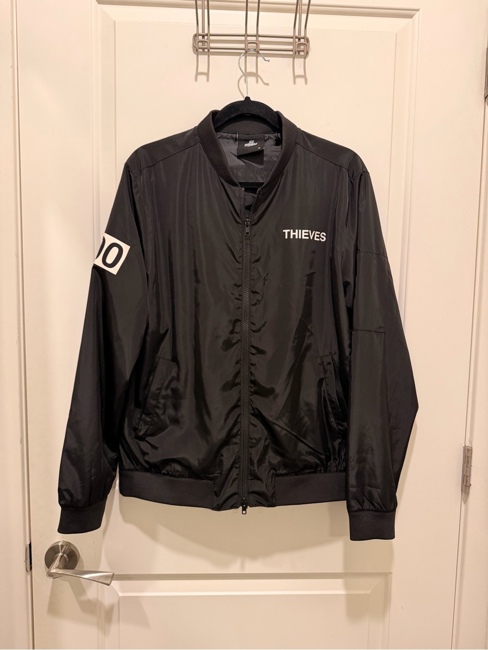 100 Thieves Numbers
Collection Bomber Jacket
Size M Black
